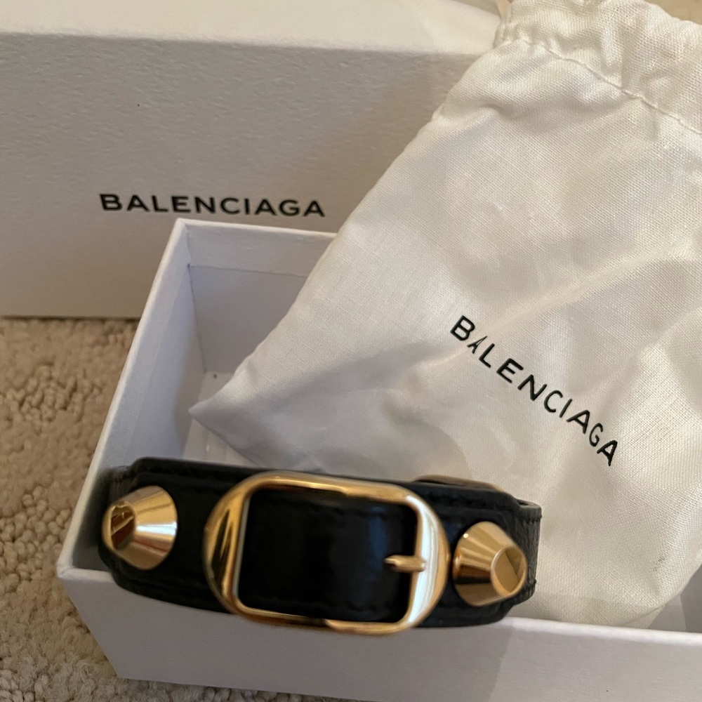 Balenciaga black leather wrap bracelet with gold hardware. In great condition!